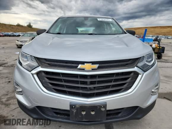 2018 Chevrolet Equinox LS с VIN 2GNAXREV8J6127216, выставлен на аукционе Copart как лот 71858945 с пробегом 40 204 миль миль и Списание • Salvage title. История ставок и продаж доступна на DreamBid. Изображение 5.
