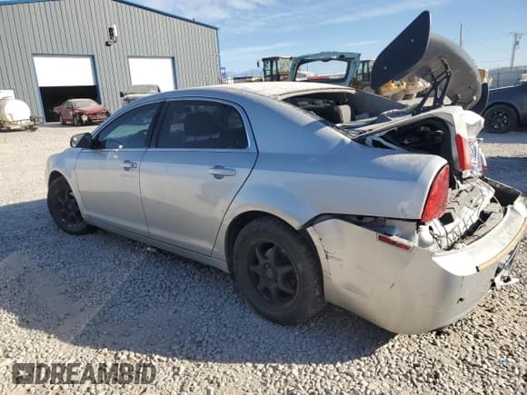 ✅ 2010 Chevrolet Malibu 1FL • VIN: 1G1ZA5E02AF106290 • Lot: 74611934. Listed on Copart with 143,823 mi. Free auction sales archive from the USA and detailed vehicle history report at DreamBid. Image 2.
