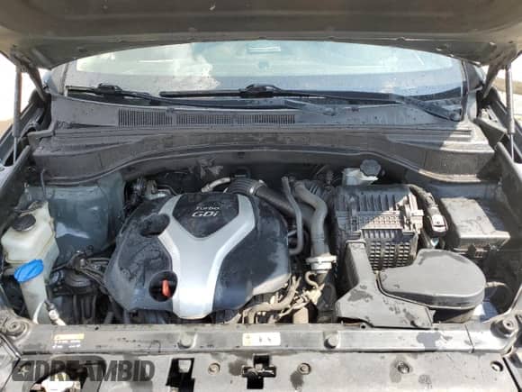 2013 Hyundai Santa Fe Sport z VIN 5XYZU3LAXDG067609, wystawiony jako Copart lot #65290195 z przebiegiem 198 057 mil mil oraz Szkoda całkowita • Salvage title. Historia ofert i sprzedaży dostępna na DreamBid. Obrazek 12.