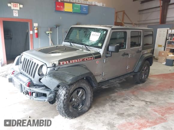✅ 2017 Jeep Wrangler Unlimited Rubicon Recon • VIN: 1C4BJWFG5HL687757 • Lot: 42367095. Listed on IAAI with 48,441 mi. Free auction sales archive from the USA and detailed vehicle history report at DreamBid. Image 2.