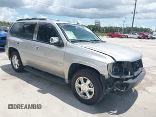 ✅ 2005 GMC Envoy SLE • VIN: 1GKDS13S252146365 • Lot: 42992924. Wystawiony na IAAI z przebiegiem 143 997 mil. Bezpłatny archiwum sprzedaży aukcyjnych z USA i szczegółowy raport historii pojazdu na DreamBid. Zdjęcie 1.