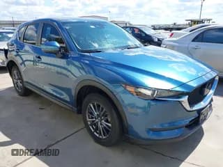 ✅ 2021 Mazda CX-5 Sport • VIN: JM3KFABM7M0408408 • Lot: 43315102. Wystawiony na IAAI z przebiegiem 34 141 mil. Bezpłatny archiwum sprzedaży aukcyjnych z USA i szczegółowy raport historii pojazdu na DreamBid. Zdjęcie 1.