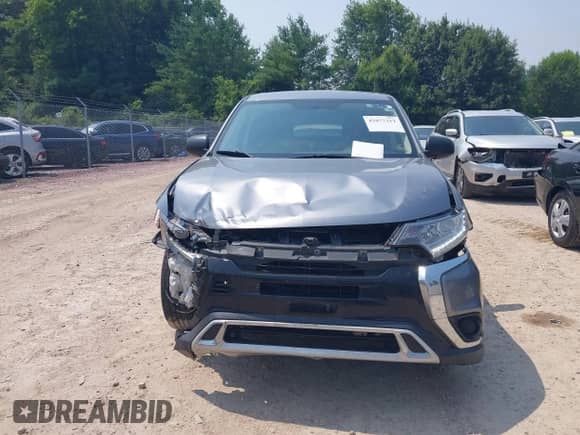 2019 Mitsubishi Outlander ES z VIN JA4AD2A35KZ055131, wystawiony jako IAAI lot #42877312 z przebiegiem 205 498 mil mil oraz . Historia ofert i sprzedaży dostępna na DreamBid. Obrazek 12.