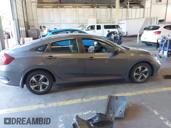 ✅ 2019 Honda Civic LX • VIN: 19XFC2F62KE208416 • Lot: 43315895. Listed on IAAI with 67,345 mi. Free auction sales archive from the USA and detailed vehicle history report at DreamBid. Image 14.