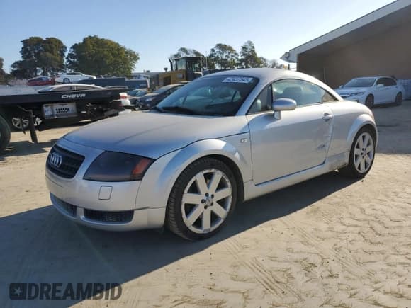✅ 2003 Audi TT • VIN: TRUWT28N031001957 • Lot: 42457545. Listed on Copart with 195,668 mi. Free auction sales archive from the USA and detailed vehicle history report at DreamBid. Image 1.