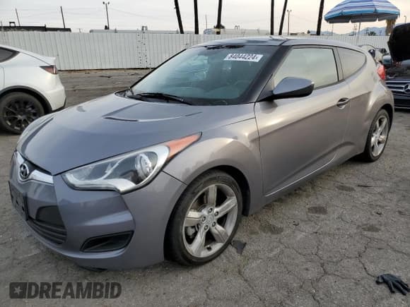 ✅ 2014 Hyundai Veloster • VIN: KMHTC6AD2EU217571 • Lot: 84044224. Listed on Copart with 137,609 mi. Free auction sales archive from the USA and detailed vehicle history report at DreamBid. Image 1.