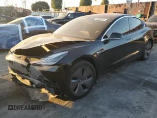 ✅ 2019 Tesla Model 3 Mid Range • VIN: 5YJ3E1EA1KF297337 • Лот: 90503255. Опубликован ранее на Copart с пробегом 63 889 миль. Бесплатный доступ к архиву аукционных продаж из США и подробный отчёт об истории автомобиля на DreamBid. Изображение 1.