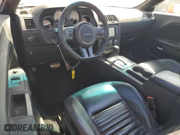 2014 Dodge Challenger R/T 100th Anniversary Appearance z VIN 2C3CDYBT7EH231394, wystawiony jako Copart lot #73204334 z przebiegiem 76 431 mil mil oraz Szkoda całkowita • Salvage title. Historia ofert i sprzedaży dostępna na DreamBid. Obrazek 8.