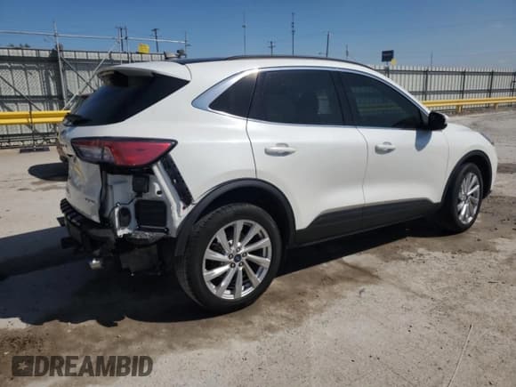 ✅ 2021 Ford Escape Titanium • VIN: 1FMCU9J92MUA30470 • Lot: 71777355. Listed on Copart with 74,169 mi. Free auction sales archive from the USA and detailed vehicle history report at DreamBid. Image 3.
