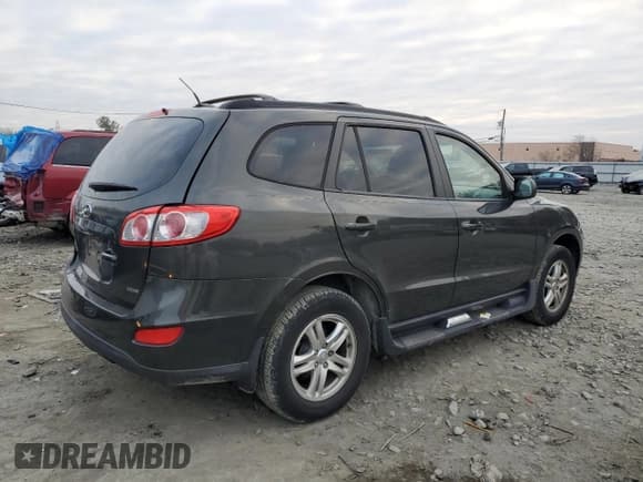 ✅ 2012 Hyundai Santa Fe GLS • VIN: 5XYZGDAG4CG110361 • Lot: 83764104. Listed on Copart with 74,859 mi. Free auction sales archive from the USA and detailed vehicle history report at DreamBid. Image 3.