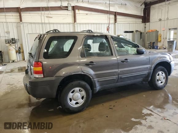 ✅ 2006 Ford Escape XLS • VIN: 1FMYU02ZX6KB47521 • Лот: 68015055. Опубликован ранее на Copart с пробегом 184 302 миль. Бесплатный доступ к архиву аукционных продаж из США и подробный отчёт об истории автомобиля на DreamBid. Изображение 3.