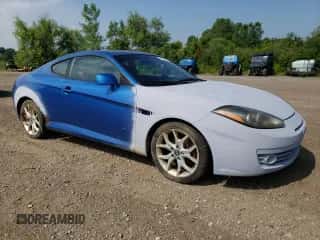 2007 Hyundai Tiburon GT с VIN KMHHN66F17U239526, выставлен на аукционе Copart как лот 64397625 с пробегом 136 807 миль миль и Списание • Salvage title. История ставок и продаж доступна на DreamBid. Изображение 4.