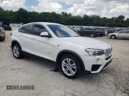 ✅ 2015 BMW X4 xDrive28i • VIN: 5UXXW3C57F0M88215 • Lot: 62342155. Listed on Copart with 178,621 mi. Free auction sales archive from the USA and detailed vehicle history report at DreamBid. Image 4.