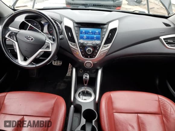 ✅ 2015 Hyundai Veloster • VIN: KMHTC6ADXFU221711 • Lot: 66359484. Wystawiony na Copart z przebiegiem 69 223 mil. Bezpłatny archiwum sprzedaży aukcyjnych z USA i szczegółowy raport historii pojazdu na DreamBid. Zdjęcie 8.