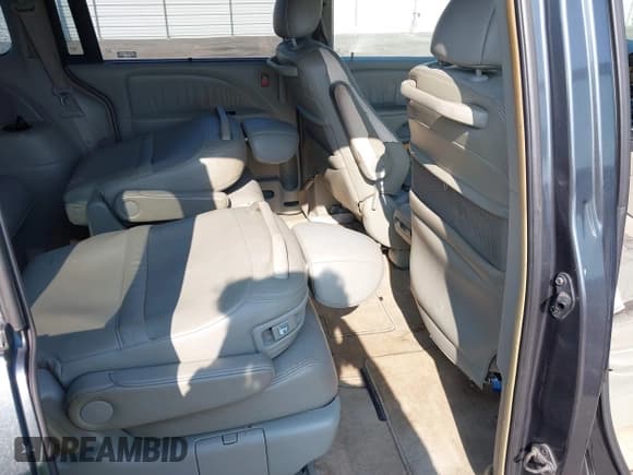 ✅ 2005 Honda Odyssey EX-L • VIN: 5FNRL38615B043649 • Лот: 43217385. Опубликован ранее на IAAI с пробегом 255 283 миль. Бесплатный доступ к архиву аукционных продаж из США и подробный отчёт об истории автомобиля на DreamBid. Изображение 8.