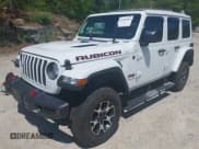 ✅ 2021 Jeep Wrangler Unlimited Rubicon • VIN: 1C4HJXFG5MW586842 • Lot: 42186683. Listed on IAAI with 76,450 mi. Free auction sales archive from the USA and detailed vehicle history report at DreamBid. Image 17.