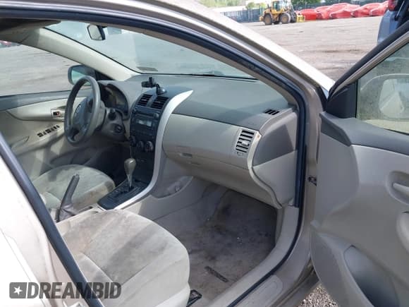 ✅ 2009 Toyota Corolla • VIN: 2T1BU40EX9C022039 • Lot: 42230127. Listed on IAAI with 131,506 mi. Free auction sales archive from the USA and detailed vehicle history report at DreamBid. Image 5.