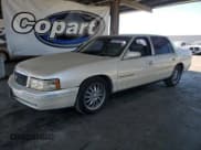 ✅ 1998 Cadillac DeVille • VIN: 1G6KF5496WU745580 • Lot: 69912165. Listed on Copart with 119,649 mi. Free auction sales archive from the USA and detailed vehicle history report at DreamBid. Image 1.