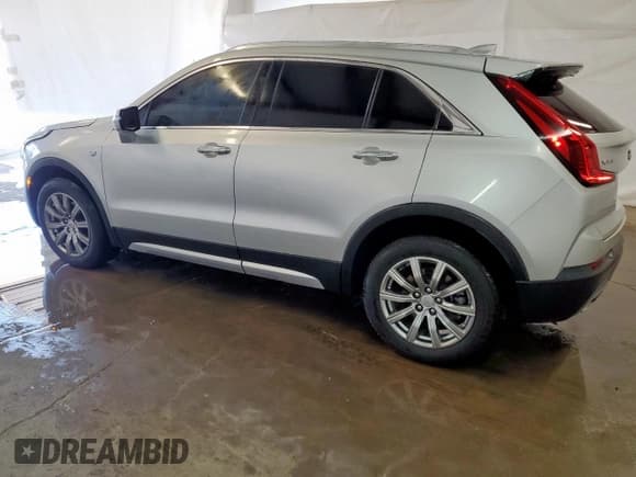 ✅ 2022 Cadillac XT4 FWD Premium Luxury • VIN: 1GYFZCR47NF100232 • Lot: 54520405. Listed on Copart with 68,819 mi. Free auction sales archive from the USA and detailed vehicle history report at DreamBid. Image 2.
