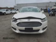 ✅ 2013 Ford Fusion SE Hybrid • VIN: 3FA6P0LU5DR240838 • Lot: 87414815. Listed on Copart with 177,809 mi. Free auction sales archive from the USA and detailed vehicle history report at DreamBid. Image 5.