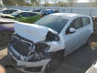 2014 Chevrolet Sonic LT z VIN 1G1JC6SH1E4227675, wystawiony jako Copart lot #68245295 z przebiegiem Nie podano mil oraz Szkoda całkowita • Salvage title. Historia ofert i sprzedaży dostępna na DreamBid. Obrazek 1.