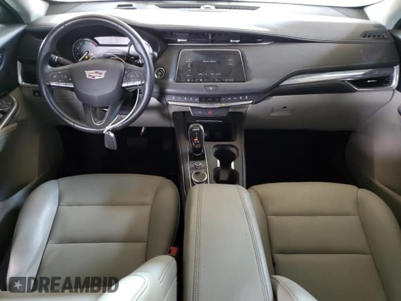 ✅ 2021 Cadillac XT4 FWD Luxury • VIN: 1GYAZAR46MF000913 • Лот: 63852165. Опубликован ранее на Copart с пробегом 30 112 миль. Бесплатный доступ к архиву аукционных продаж из США и подробный отчёт об истории автомобиля на DreamBid. Изображение 8.