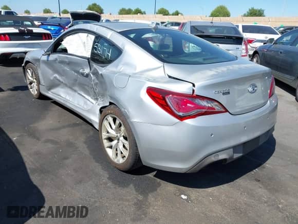 2014 Hyundai Genesis Coupe Ultimate z VIN KMHHU6KJ8EU118440, wystawiony jako IAAI lot #43353174 z przebiegiem 69 846 mil mil oraz . Historia ofert i sprzedaży dostępna na DreamBid. Obrazek 3.