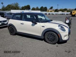 2019 MINI Hardtop Cooper with VIN WMWXP5C52K2H29767, listed as a Copart auction lot 61006445 with 50,212 mi miles and Salvage title. Bid and sale history available at DreamBid. Image 4.