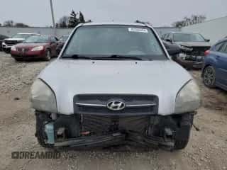 2005 Hyundai Tucson GL z VIN KM8JM12B75U146582, wystawiony jako Copart lot #82966094 z przebiegiem 132 445 mil mil oraz Nie do naprawy • Non repairable. Historia ofert i sprzedaży dostępna na DreamBid. Obrazek 5.