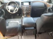 ✅ 2015 Infiniti QX80 • VIN: JN8AZ2NEXF9084279 • Lot: 80037355. Listed on Copart with 154,215 mi. Free auction sales archive from the USA and detailed vehicle history report at DreamBid. Image 8.