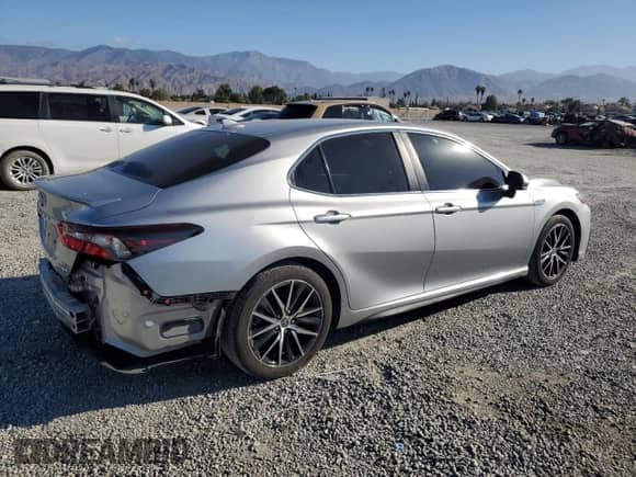 2021 Toyota Camry Hybrid SE с VIN 4T1G31AK7MU556263, выставлен на аукционе Copart как лот 84229075 с пробегом 104 650 миль миль и Списание • Salvage title. История ставок и продаж доступна на DreamBid. Изображение 3.