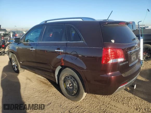 ✅ 2011 Kia Sorento SX • VIN: 5XYKWDA23BG120421 • Лот: 82649355. Опубликован ранее на Copart с пробегом 129 464 миль. Бесплатный доступ к архиву аукционных продаж из США и подробный отчёт об истории автомобиля на DreamBid. Изображение 2.