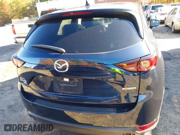 ✅ 2021 Mazda CX-5 Touring • VIN: JM3KFBCM2M0446455 • Lot: 43464164. Wystawiony na IAAI z przebiegiem 161 106 mil. Bezpłatny archiwum sprzedaży aukcyjnych z USA i szczegółowy raport historii pojazdu na DreamBid. Zdjęcie 16.