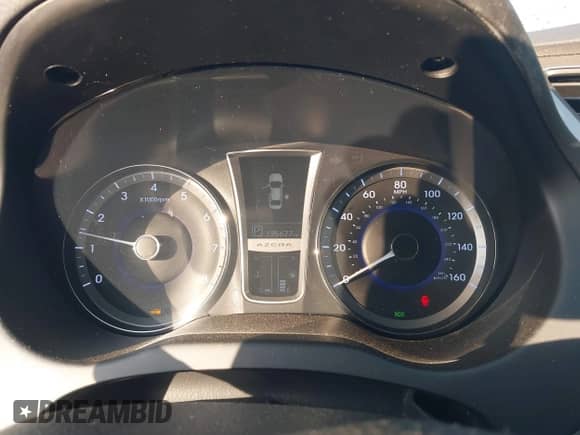 2013 Hyundai Azera z VIN KMHFG4JG6DA243655, wystawiony jako IAAI lot #41802097 z przebiegiem 135 677 mil mil oraz . Historia ofert i sprzedaży dostępna na DreamBid. Obrazek 7.