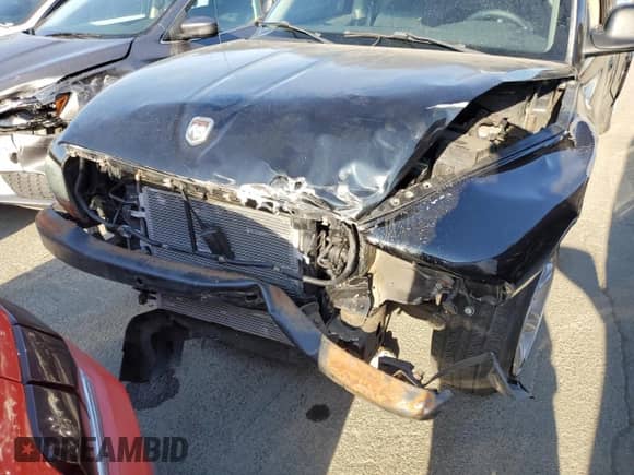 2001 Dodge Dakota Sport z VIN 1B7GL22Z01S315190, wystawiony jako Copart lot #60171404 z przebiegiem 145 397 mil mil oraz Nie do naprawy • Non repairable. Historia ofert i sprzedaży dostępna na DreamBid. Obrazek 11.