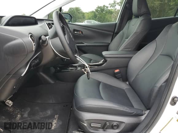 2021 Toyota Prius L Eco with VIN JTDKAMFU4M3139334, listed as a Copart auction lot 84025305 with 59,418 mi miles and Salvage title. Bid and sale history available at DreamBid. Image 7.