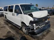✅ 2023 Chevrolet Express Passenger LS • VIN: 1GAZGNFP3P1234182 • Lot: 90387125. Listed on Copart with 36,837 mi. Free auction sales archive from the USA and detailed vehicle history report at DreamBid. Image 4.