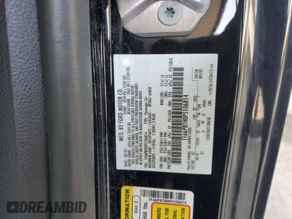 2023 Ford Mustang EcoBoost z VIN 1FA6P8TH0P5106814, wystawiony jako Copart lot #59118305 z przebiegiem 60 114 mil mil oraz Szkoda całkowita • Salvage title. Historia ofert i sprzedaży dostępna na DreamBid. Obrazek 12.
