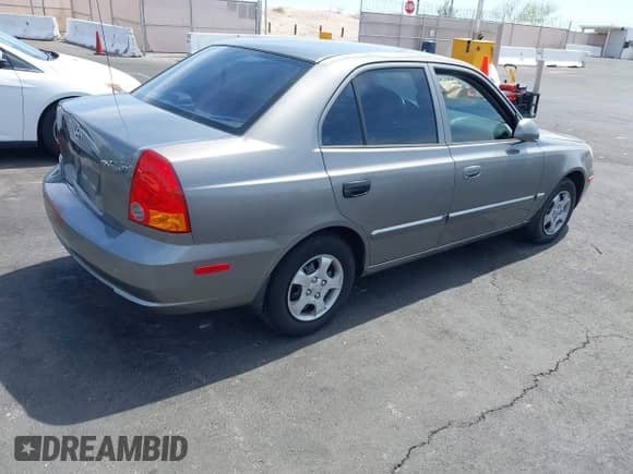 2003 Hyundai Accent GL with VIN KMHCG45C73U471607, listed as a IAAI auction lot 41956551 with 222,305 mi miles and . Bid and sale history available at DreamBid. Image 4.