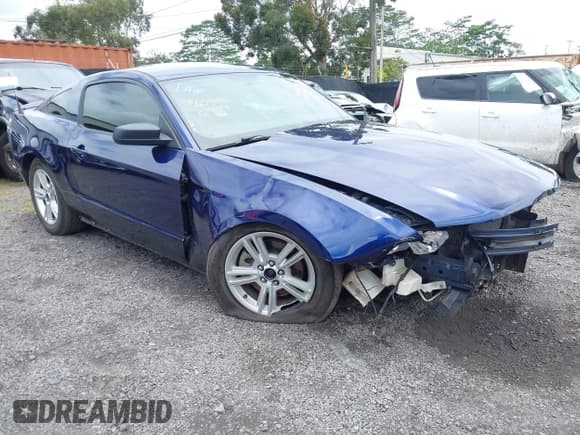 ✅ 2012 Ford Mustang Premium • VIN: 1ZVBP8AM2C5263843 • Lot: 42597186. Listed on IAAI with 56,026 mi. Free auction sales archive from the USA and detailed vehicle history report at DreamBid. Image 1.