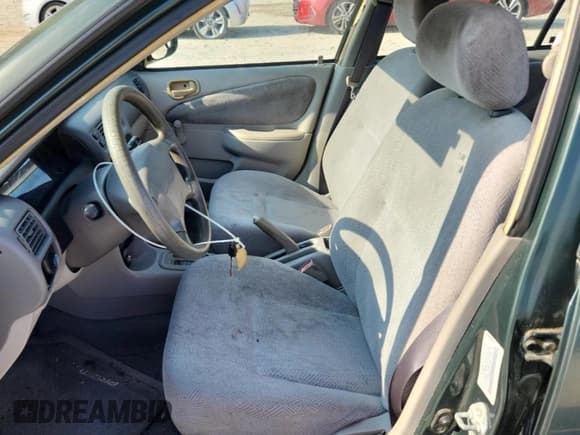 ✅ 2000 Chevrolet Prizm • VIN: 1Y1SK5284YZ411021 • Lot: 66666935. Listed on Copart with 137,188 mi. Free auction sales archive from the USA and detailed vehicle history report at DreamBid. Image 7.