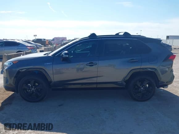 ✅ 2021 Toyota RAV4 Hybrid XSE • VIN: 4T3E6RFVXMU006689 • Lot: 43371921. Listed on IAAI with 90,853 mi. Free auction sales archive from the USA and detailed vehicle history report at DreamBid. Image 14.