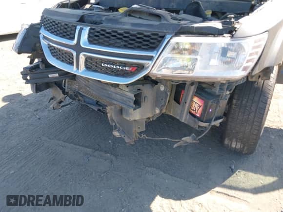 2015 Dodge Journey American Value z VIN 3C4PDCAB7FT559299, wystawiony jako IAAI lot #43409195 z przebiegiem 183 905 mil mil oraz . Historia ofert i sprzedaży dostępna na DreamBid. Obrazek 6.