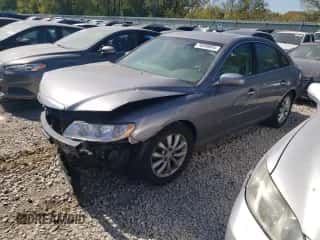 2007 Hyundai Azera SE z VIN KMHFC46F67A185837, wystawiony jako Copart lot #74260854 z przebiegiem 109 970 mil mil oraz Szkoda całkowita • Salvage title. Historia ofert i sprzedaży dostępna na DreamBid. Obrazek 1.