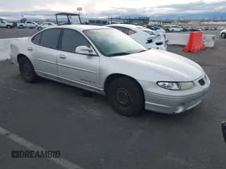 ✅ 2001 Pontiac Grand Prix SE • VIN: 1G2WK52J11F216496 • Lot: 43736970. Listed on IAAI with 229,153 mi. Free auction sales archive from the USA and detailed vehicle history report at DreamBid. Image 1.