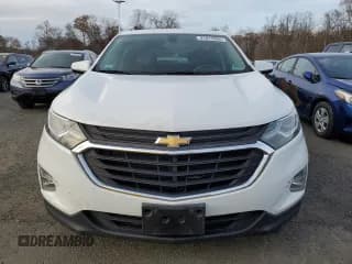 ✅ 2018 Chevrolet Equinox LT • VIN: 2GNAXSEV6J6256059 • Lot: 91813995. Wystawiony na Copart z przebiegiem 96 132 mil. Bezpłatny archiwum sprzedaży aukcyjnych z USA i szczegółowy raport historii pojazdu na DreamBid. Zdjęcie 5.