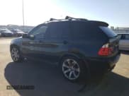 ✅ 2005 BMW X5 4.8is • VIN: 5UXFA93515LE83489 • Lot: 87840265. Listed on Copart with 131,786 mi. Free auction sales archive from the USA and detailed vehicle history report at DreamBid. Image 2.