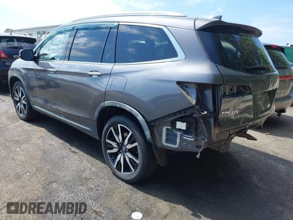 ✅ 2019 Honda Pilot Touring 8-Passenger • VIN: 5FNYF5H95KB010979 • Lot: 43285702. Listed on IAAI with 147,812 mi. Free auction sales archive from the USA and detailed vehicle history report at DreamBid. Image 3.