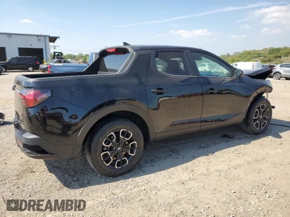✅ 2022 Hyundai Santa Cruz SEL • VIN: 5NTJBDAE6NH028252 • Lot: 81002405. Listed on Copart with 69,670 mi. Free auction sales archive from the USA and detailed vehicle history report at DreamBid. Image 3.