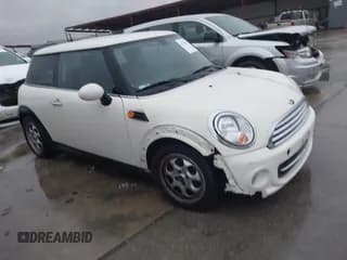 ✅ 2012 MINI Hardtop • VIN: WMWSU3C52CT261877 • Lot: 43799254. Listed on IAAI with 101,341 mi. Free auction sales archive from the USA and detailed vehicle history report at DreamBid. Image 1.